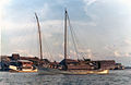 Two working bedars both about 45' (LOD) sitting in front of Chinatown in Kuala Terengganu, waiting to unload their cargo, 1980