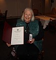 Turid with her Badge of Honour from Norwegian King, HM King Harald VII