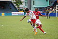 Un joueur du Victory SC (en blanc) lors d'un match contre le South China AA durant la Coupe de l'AFC 2008 au stade