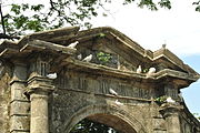 Detail on top of the entrance of Paco Park.