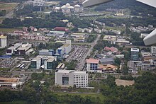 Government buildings seen at the site of the former Brunei Airport in 2022. Brunei 9 August 2022 04.jpg