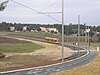 Montpellier Tramway line 2 in Castelnau-le-Lez along abicycle path in 2006