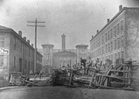 Cincinnati Riots 1884 Barricade on Court Street.jpg