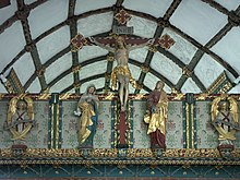 Crucifix on the rood screen at Blisland, Cornwall Crucifix, Church of St. Protus and St. Hyacinth at Blisland (June 2004).jpg