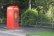 Listed telephone box at the garden entrance