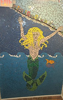 Mermaid an 8 feet high mosaic located on the staircase of 1620 building