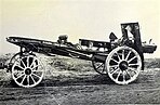 A carriage with limber broken down for transport.