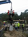 Ombouw overweg Brandsweg in Nunspeet. Het inhijsen van de nieuwe Mini-AHOB.