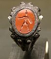 Ring with gladiator. Bronze and red jasper, Roman art, 3rd century CE