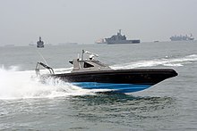 An Interceptor Craft, Spikefish (PK50), from the Special Task Squadron demonstrating its capabilities during a maritime exercise mockup display as part of the 2005 National Day Parade celebrations Special Task Squadron Boat.jpg