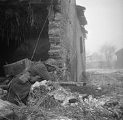 Soldier firing on German positions during 12th Corp's offensive north of Sittard, 16 January 1945 The Campaign in North West Europe 1944-45 B13712.jpg