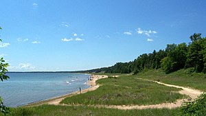 The beach for Whitefish Dunes State Park in no...