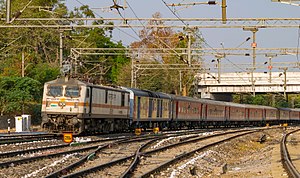 Indian Railways train 22691 SBC-NZM Rajdhani Express near Lingampally Railway Station