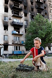 A damaged tower block in Lysychansk, 28 July 2014 Burned apartment building in Lysychansk, July 28, 2014.jpg