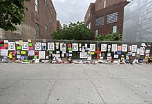 Organized by Harlem resident Gerdine Behrmann, the community created a George Floyd Tribute Wall along the 135th Street side of the Schomburg Center for Research in Black Culture in 2020. George Floyd Tribute.jpg