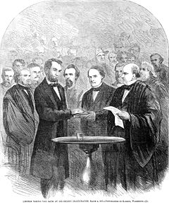 Lincoln taking the oath at his second inauguration.jpg