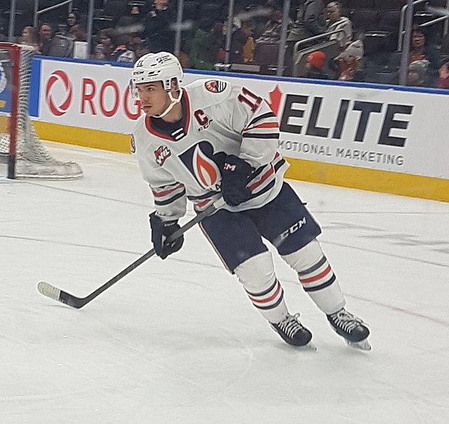 Photographie couleur d'un joueur de hockey sur glace