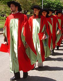 PhD candidates march at Commencement in McGill's distinctive scarlet regalia. Proud graduates.jpg