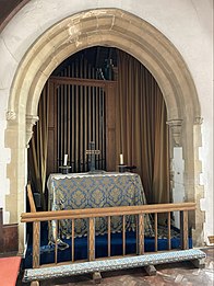 The organ chamber of 1912 with the north aisle altar