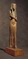 Estatuilla que representa a una mujer con kalasiris, entre 1292 y 1190 a.C., Imperio Nuevo. Museo Egipcio de Turín.