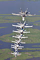 29 US Navy 090711-N-9712C-007 ight F-A-18 Hornets assigned the River Rattlers, Strike Fighter Squadron (VFA) 204, fly in a column formation over southern Louisiana's wetlands during a photo exercise