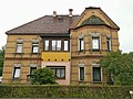 Wohnhaus mit Einfriedung