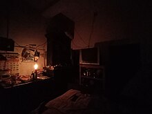 A room during load shedding at night in West Bengal, India. A room during load shedding at night in West Bengal, India.jpg