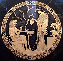 Athena pouring a drink for Heracles, who wears the skin of the Nemean Lion Athena Herakles Staatliche Antikensammlungen 2648.jpg