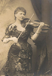 The portrait features a woman in her twenties in a gown playing the violin.