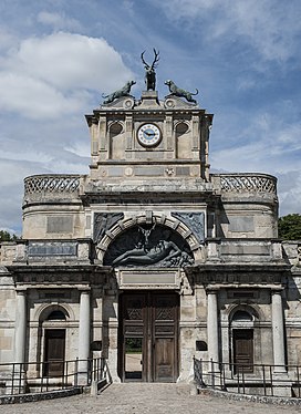 Long view showing its location above the entrance gate at Anet