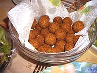 Spherical fritters in a bowl