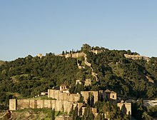 The Alcazaba and the Castle of Gibralfaro, part of the elaborate fortifications that protected Malaga in the Nasrid period Gibralfaro.jpg