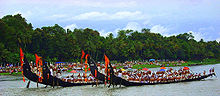 The annual snake boat race is performed during Onam on the Pamba River Kerala boatrace.jpg