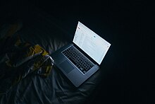 Reading mail at night (Unsplash).jpg