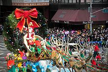 Santa Claus' arrival at the parade's finale marks the start of the Christmas season Santa Claus arrives..jpg