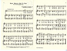 Two sheets of sheet music entitled "Music Masters, Hail to Thee" lie side by side.