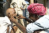 Strjitbarbier yn Rajasthan, Yndia