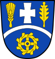 Gemeinde Habach In Blau ein silberner Regenbogen, darüber ein silbernes Ulrichskreuz, beseitet rechts von einer goldenen Ähre, links von einem senkrechten goldenen Eichenblatt, darunter ein goldenes Mühlrad.