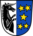 Gemeinde Schönau Gespalten von Silber und Blau; vorne ein nach links gewendeter schwarzer Einhornrumpf, hinten fünf, zwei zu eins zu zwei gestellte, fünfstrahlige goldene Sterne.