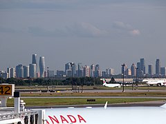 Higher-density development in Mississauga as seen from Toronto's Pearson Airport Mississauga skyline Pearson 2013.jpg