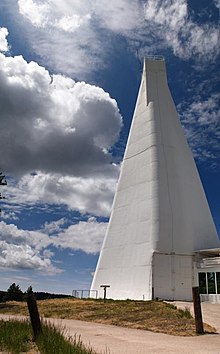Photo of the white tower of the Richard B. Dunn Solar Telescope