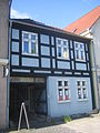 Wohn- und Geschäftshaus mit Speichergebäude I und II (im Hof)