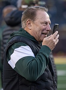 Tom Izzo on the sidelines at a football game