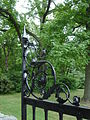 Ironwork with an oak leaf motif at the entrance gate