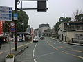 熊本城稲荷神社横、熊本県道303号を1kmほど登ると京町一丁目の標識が見える。