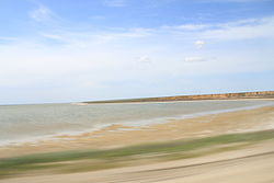 Lake Manych-Gudilo, a protected area of Russia, is partially located in Priyutnensky District