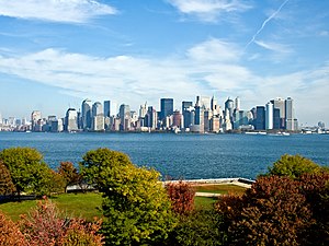 English: Skyline of New York City from Ellis I...