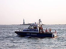 A NYPD boat on patrol in New York Harbor in 2006 NYPD boat99pct.jpg