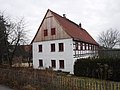 Wohnstallhaus und Schuppen eines Bauernhofes