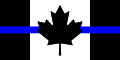 Le drapeau du Canada orné de la thin blue line.